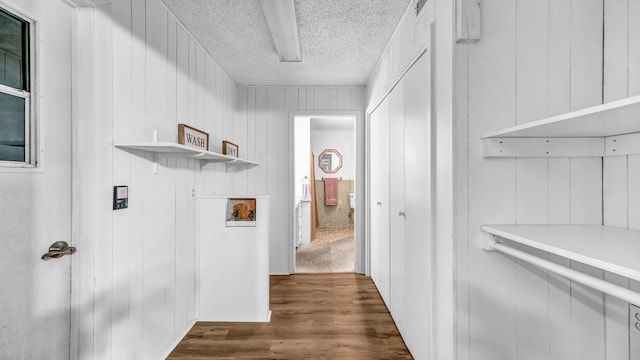 100 Oakhurst Dr, Hurst, TX 76053 - hall with a textured ceiling and dark wood finished floors