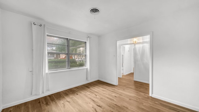 100 Oakhurst Dr, Hurst, TX 76053 - unfurnished room with light wood-style flooring and baseboards