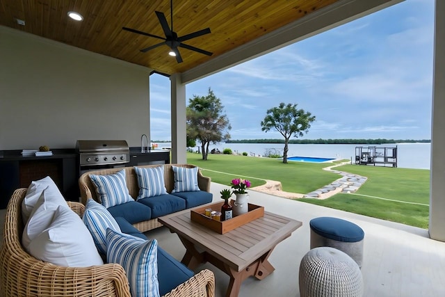 733 El Barco, Corsicana, TX 75109 - view of patio with an outdoor kitchen, a grill, a water view, an outdoor hangout area, and ceiling fan