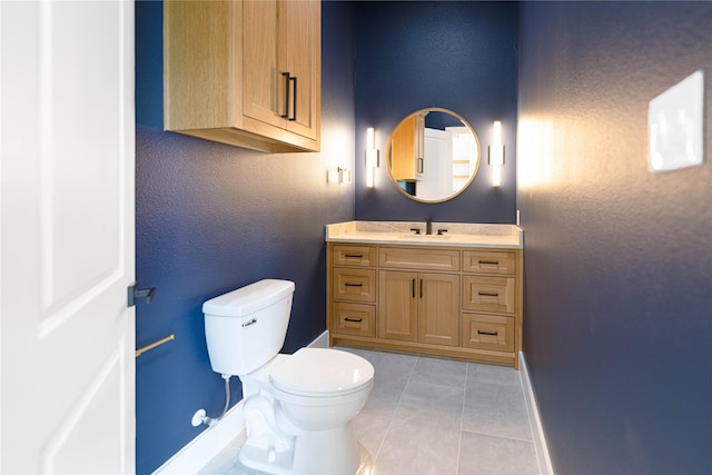 733 El Barco, Corsicana, TX 75109 - bathroom featuring baseboards, toilet, tile patterned floors, and vanity