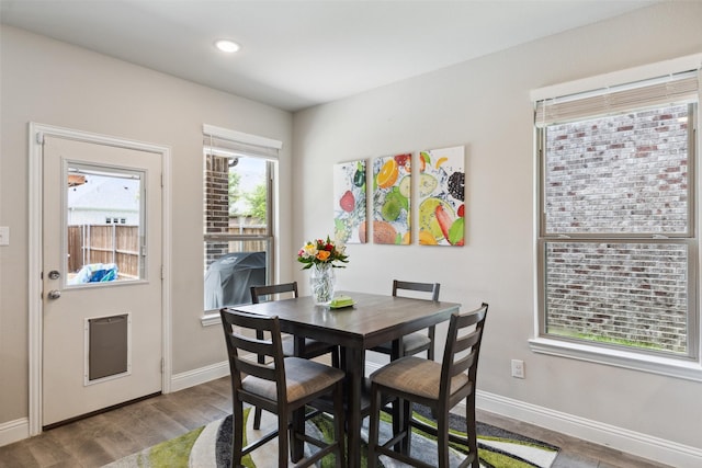 5909 Horsetail Dr, Mckinney, TX 75071 - dining area featuring baseboards, wood finished floors, and recessed lighting