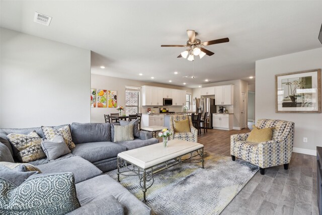 5909 Horsetail Dr, Mckinney, TX 75071 - living room with ceiling fan, recessed lighting, light wood-style flooring, and baseboards