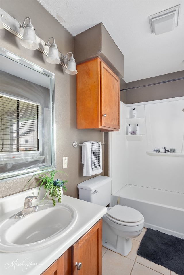 3636 Greenacres Place Dr Unit 33, Bossier City, LA 71111 - full bathroom with toilet, tile patterned floors, vanity, and tub / shower combination