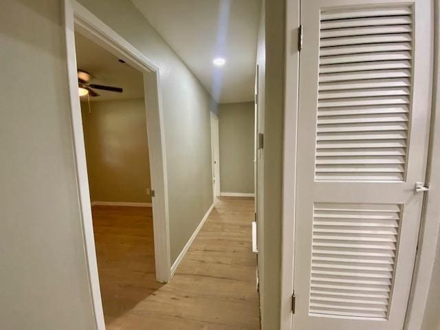 4916 Tracy Dr, Haltom City, TX 76117 - corridor with light wood-style flooring, a heating unit, and baseboards
