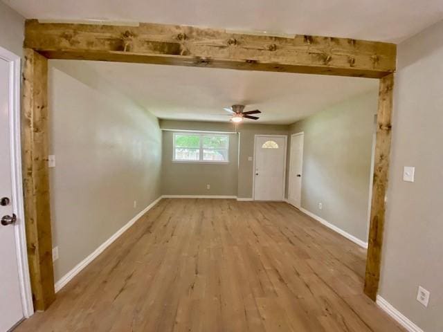 4916 Tracy Dr, Haltom City, TX 76117 - foyer entrance featuring light wood finished floors, ceiling fan, and baseboards