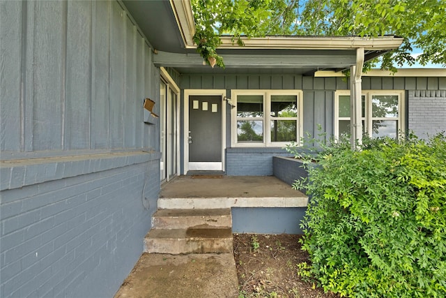 4208 Huckleberry Cir, Dallas, TX 75216 - entrance to property with board and batten siding and brick siding