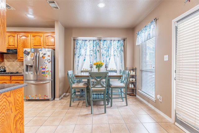 6500 Fannin Farm Way, Arlington, TX 76001 - dining room featuring light tile patterned floors, recessed lighting, and baseboards