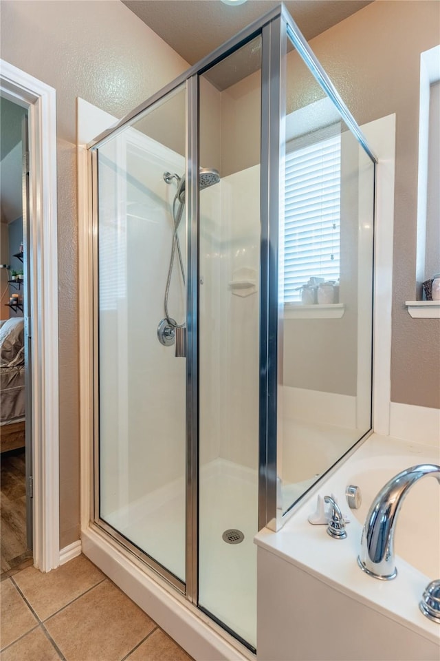 6500 Fannin Farm Way, Arlington, TX 76001 - bathroom with a stall shower, tile patterned flooring, a bath, and connected bathroom