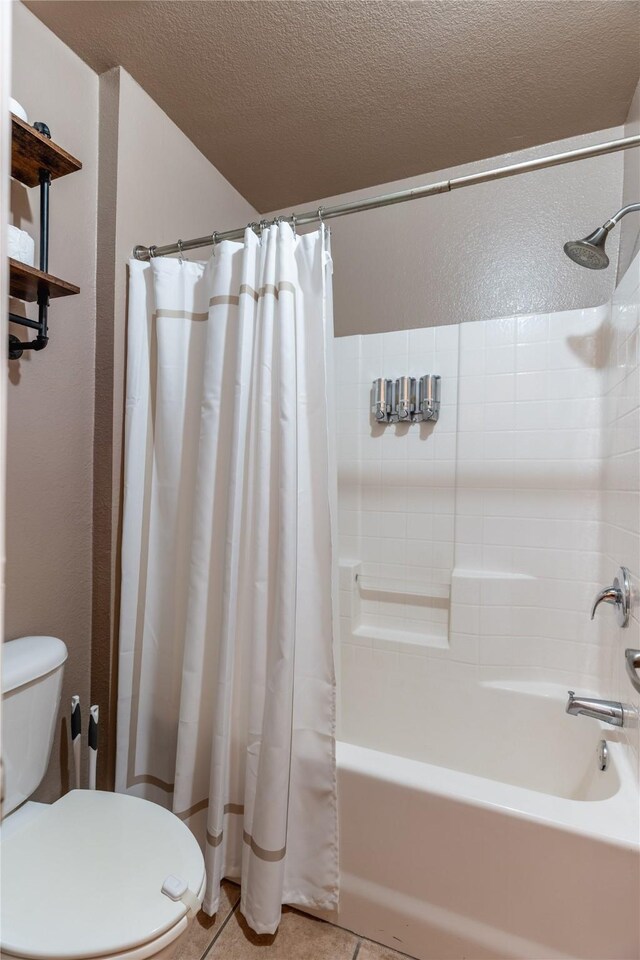 6500 Fannin Farm Way, Arlington, TX 76001 - bathroom featuring toilet, shower / tub combo, tile patterned flooring, and a textured ceiling