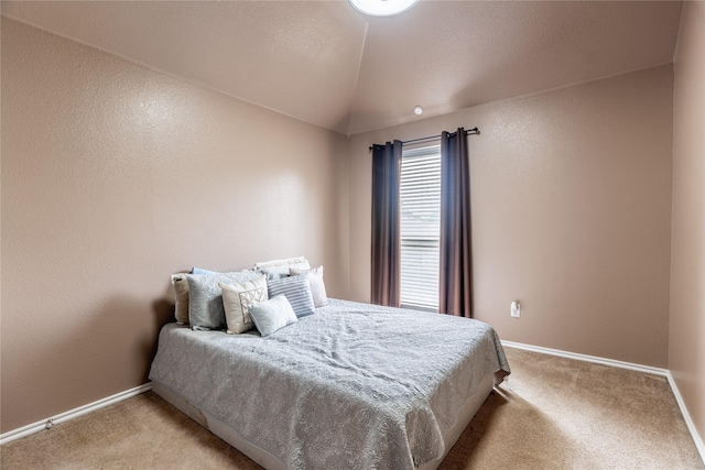 6500 Fannin Farm Way, Arlington, TX 76001 - bedroom featuring light carpet, lofted ceiling, and baseboards