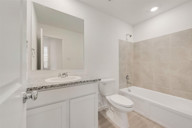 4213 Brindley Rd, Little Elm, TX 75068 - bathroom featuring toilet, wood finished floors, vanity, and shower / bath combination