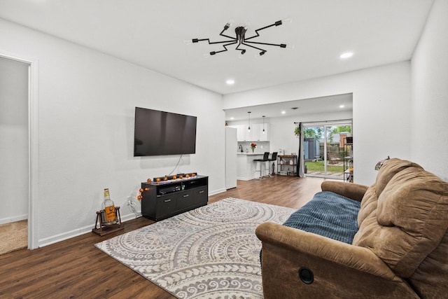 1807 W Belden St, Sherman, TX 75092 - living room featuring dark wood-type flooring, recessed lighting, and baseboards