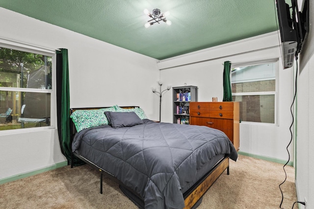 1807 W Belden St, Sherman, TX 75092 - bedroom with carpet flooring, a textured ceiling, and baseboards