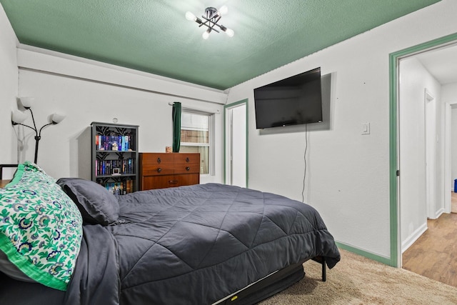 1807 W Belden St, Sherman, TX 75092 - bedroom with a textured ceiling, a closet, and baseboards