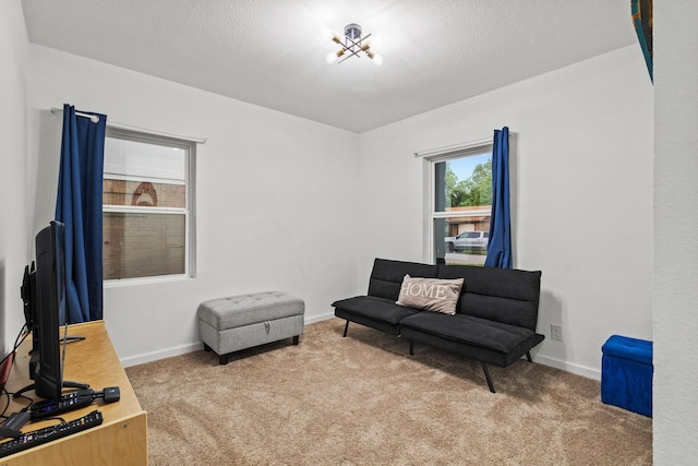 1807 W Belden St, Sherman, TX 75092 - living area with carpet flooring and baseboards