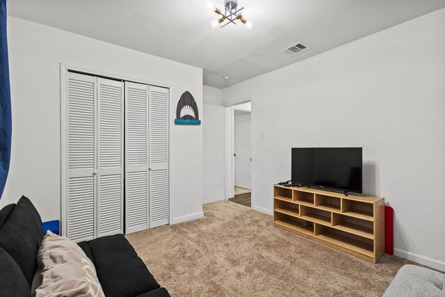 1807 W Belden St, Sherman, TX 75092 - living room with carpet flooring and baseboards