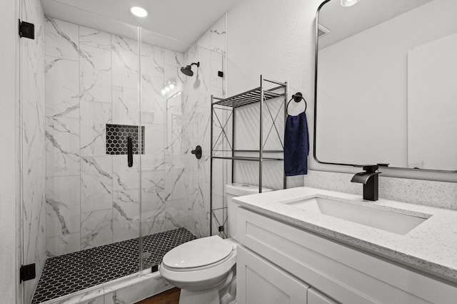 1807 W Belden St, Sherman, TX 75092 - full bath with toilet, a marble finish shower, vanity, and recessed lighting