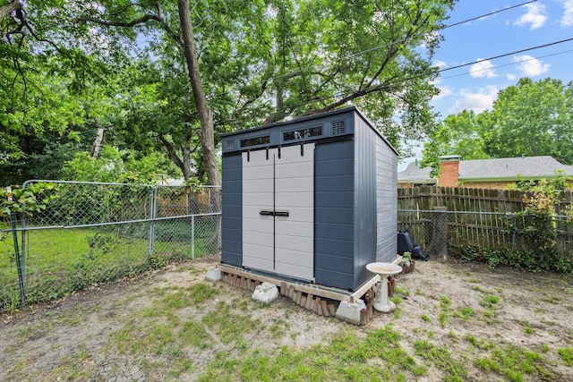 1807 W Belden St, Sherman, TX 75092 - view of shed featuring a fenced backyard