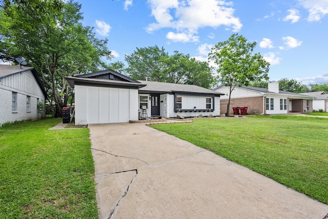 1807 W Belden St, Sherman, TX 75092 - single story home featuring driveway, brick siding, and a front lawn