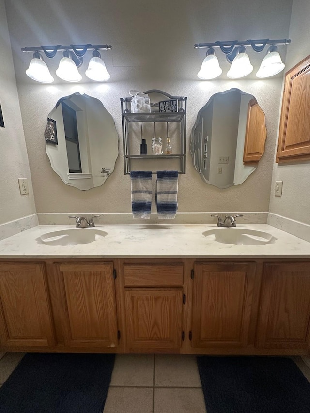 7568 Casburn Ct, Fort Worth, TX 76120 - bathroom with tile patterned flooring and double vanity