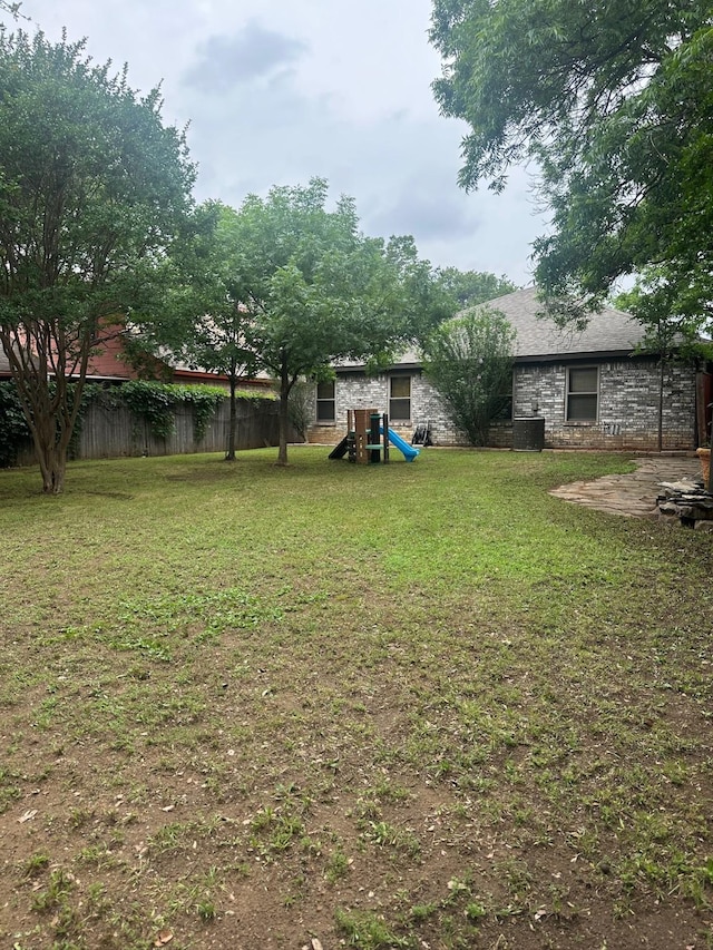 7568 Casburn Ct, Fort Worth, TX 76120 - view of yard featuring a playground