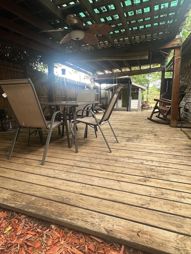 7568 Casburn Ct, Fort Worth, TX 76120 - wooden terrace with ceiling fan