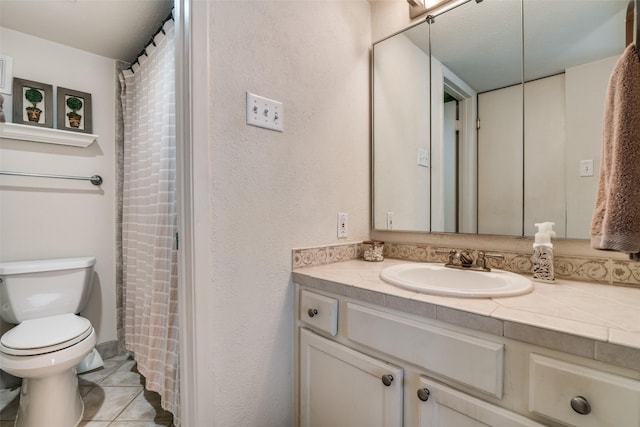 4559 N O Connor Rd Unit 2289, Irving, TX 75062 - full bathroom featuring toilet, vanity, and tile patterned floors