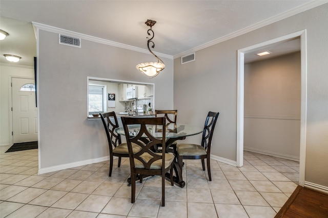 4559 N O Connor Rd Unit 2289, Irving, TX 75062 - dining room with ornamental molding, light tile patterned flooring, and baseboards