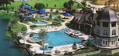 1341 Bristol Ln, Providence Village, TX 76227 - drone / aerial view of a pool and a nearby body of water