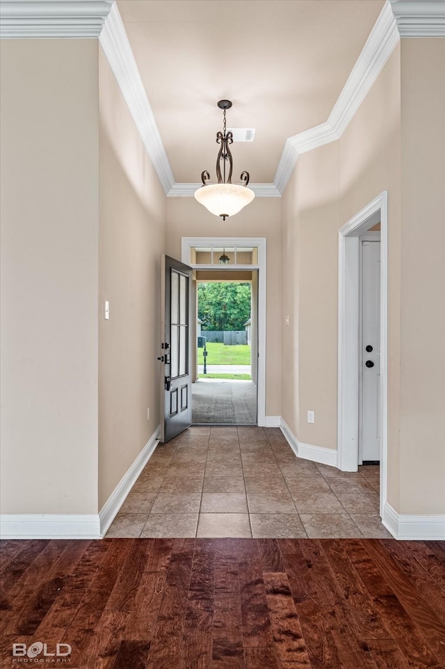 9214 Mykanos Trl, Shreveport, LA 71106 - tiled entryway with ornamental molding and baseboards