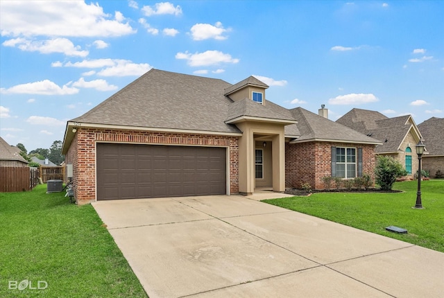9214 Mykanos Trl, Shreveport, LA 71106 - view of front facade with driveway, brick siding, a garage, roof with shingles, and central air condition unit