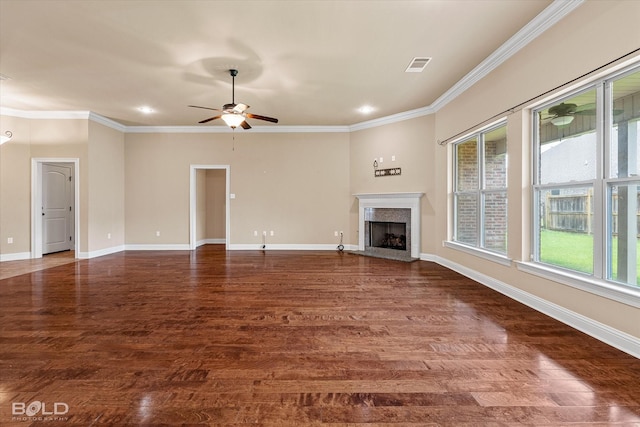 9214 Mykanos Trl, Shreveport, LA 71106 - unfurnished living room featuring wood finished floors, crown molding, a high end fireplace, a ceiling fan, and recessed lighting
