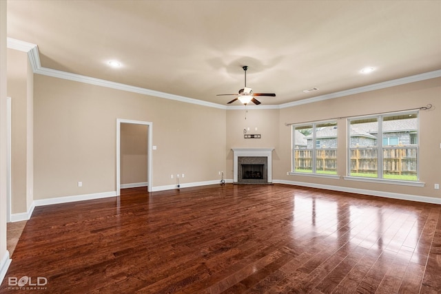 9214 Mykanos Trl, Shreveport, LA 71106 - unfurnished living room with dark wood-style floors, ceiling fan, crown molding, baseboards, and a fireplace