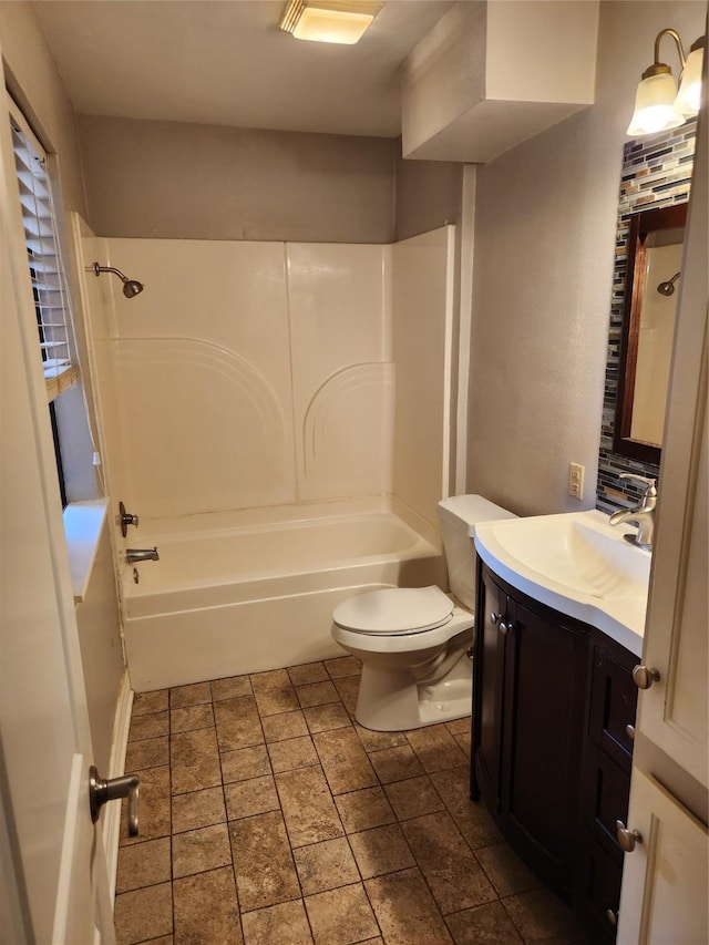 3636 Greenacres Place Dr Unit 45, Bossier City, LA 71111 - bathroom with toilet, vanity, washtub / shower combination, and stone finish flooring