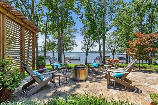 16887 Rainbow Ridge Cir, Tyler, TX 75707 - view of patio / terrace featuring a water view and an outdoor fire pit