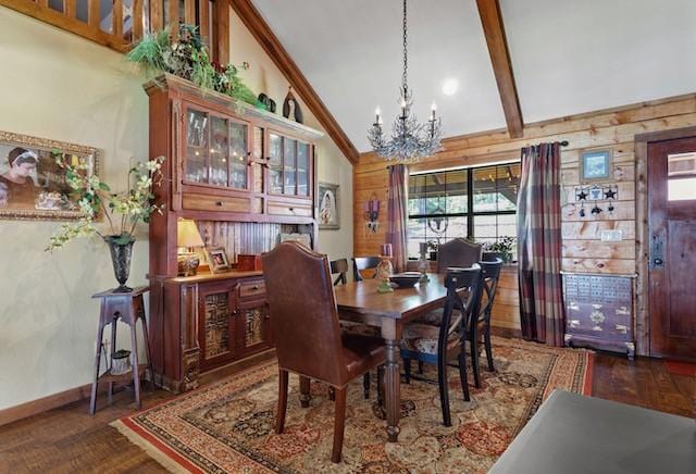 16887 Rainbow Ridge Cir, Tyler, TX 75707 - dining space with a chandelier, wood finished floors, wooden walls, beam ceiling, and high vaulted ceiling