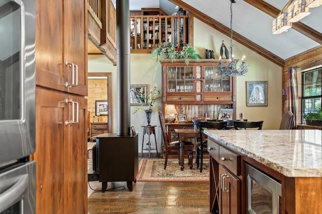 16887 Rainbow Ridge Cir, Tyler, TX 75707 - bar area featuring dark wood-style floors, stainless steel oven, wine cooler, and pendant lighting