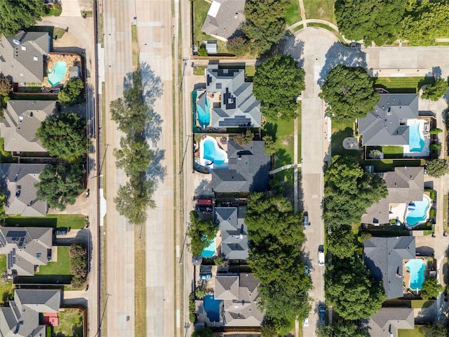 2324 Claridge Cir, Plano, TX 75075 - aerial overview of property's location with nearby suburban area and a pool area