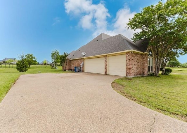 215 Harvest Rdg, Mclendon Chisholm, TX 75032 - view of property exterior with a garage, concrete driveway, a lawn, and brick siding