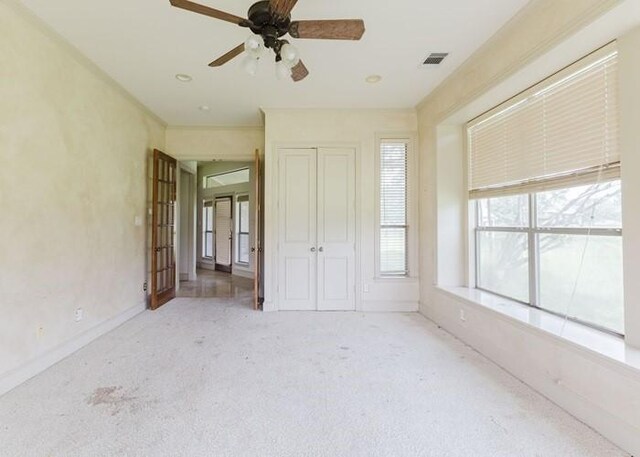 215 Harvest Rdg, Mclendon Chisholm, TX 75032 - unfurnished bedroom with carpet, a closet, a ceiling fan, and baseboards