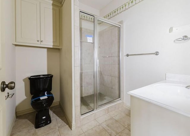 215 Harvest Rdg, Mclendon Chisholm, TX 75032 - bathroom featuring a stall shower, baseboards, and tile patterned floors