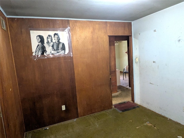 2214 N Woodland St, Amarillo, TX 79107 - unfurnished bedroom featuring wooden walls