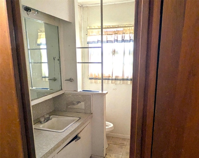 2214 N Woodland St, Amarillo, TX 79107 - half bath featuring toilet and vanity