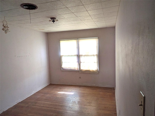 2214 N Woodland St, Amarillo, TX 79107 - empty room featuring wood finished floors and baseboards