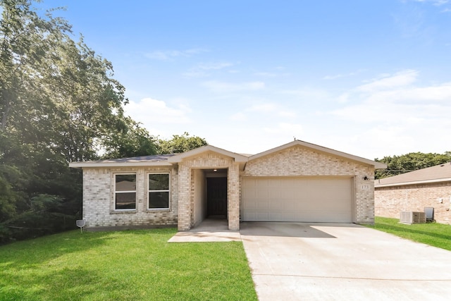 173 Westview Dr, Gun Barrel City, TX 75156 - ranch-style house featuring brick siding, an attached garage, driveway, a front yard, and central AC