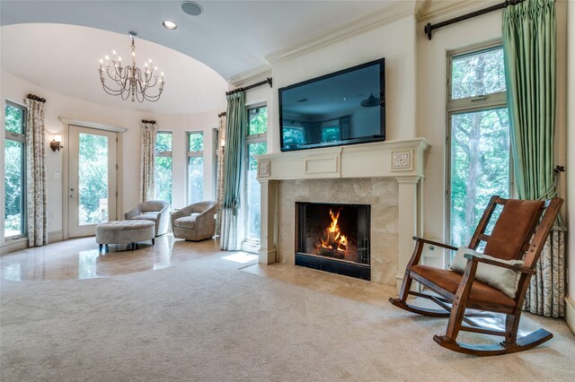 2306 Autumn Run Ct, Cedar Hill, TX 75104 - living area featuring a tile fireplace, a chandelier, ornamental molding, lofted ceiling, and recessed lighting
