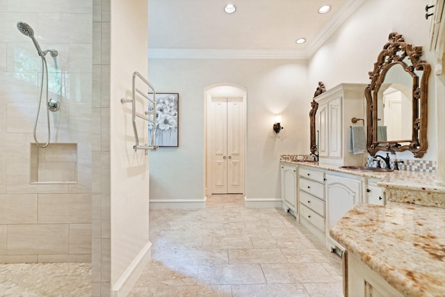 2306 Autumn Run Ct, Cedar Hill, TX 75104 - bathroom with crown molding, vanity, walk in shower, baseboards, and recessed lighting