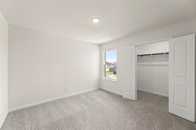 122 Doma Ave, Greenville, TX 75402 - carpeted bedroom featuring baseboards