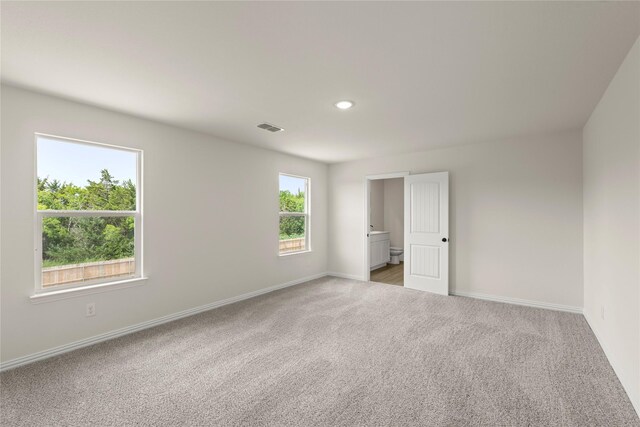 122 Doma Ave, Greenville, TX 75402 - carpeted bedroom with baseboards