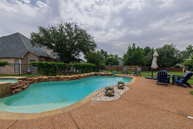 3404 Brookshire Run, Corinth, TX 76210 - view of swimming pool featuring fence, a patio area, and a pool with connected hot tub